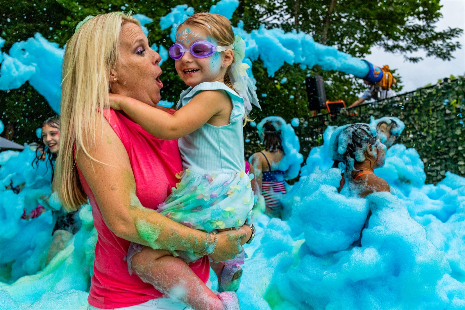 An outdoor blue foam party at a Middle Tennessee backyard summer birthday by EPIC Parties