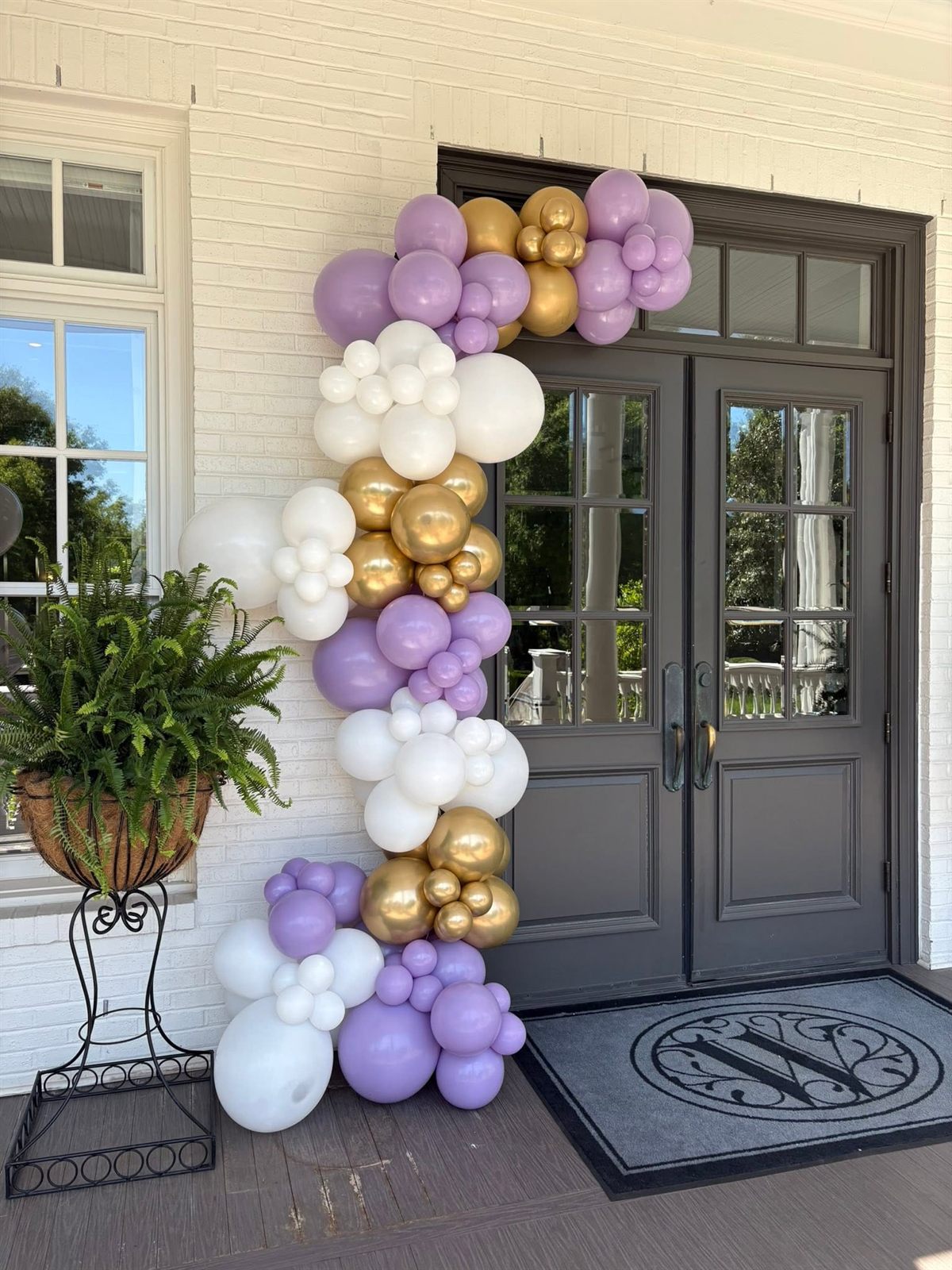 An elegant balloon-garland entrance showing EPIC Parties' event styling in Middle Tennessee